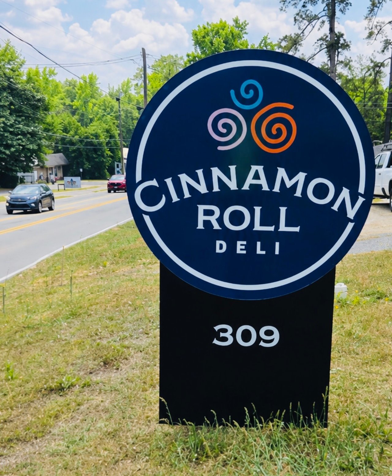 Cinnamon Roll Deli sign outside its newly opened Lexington, South Carolina location at 309 South Lake Drive.