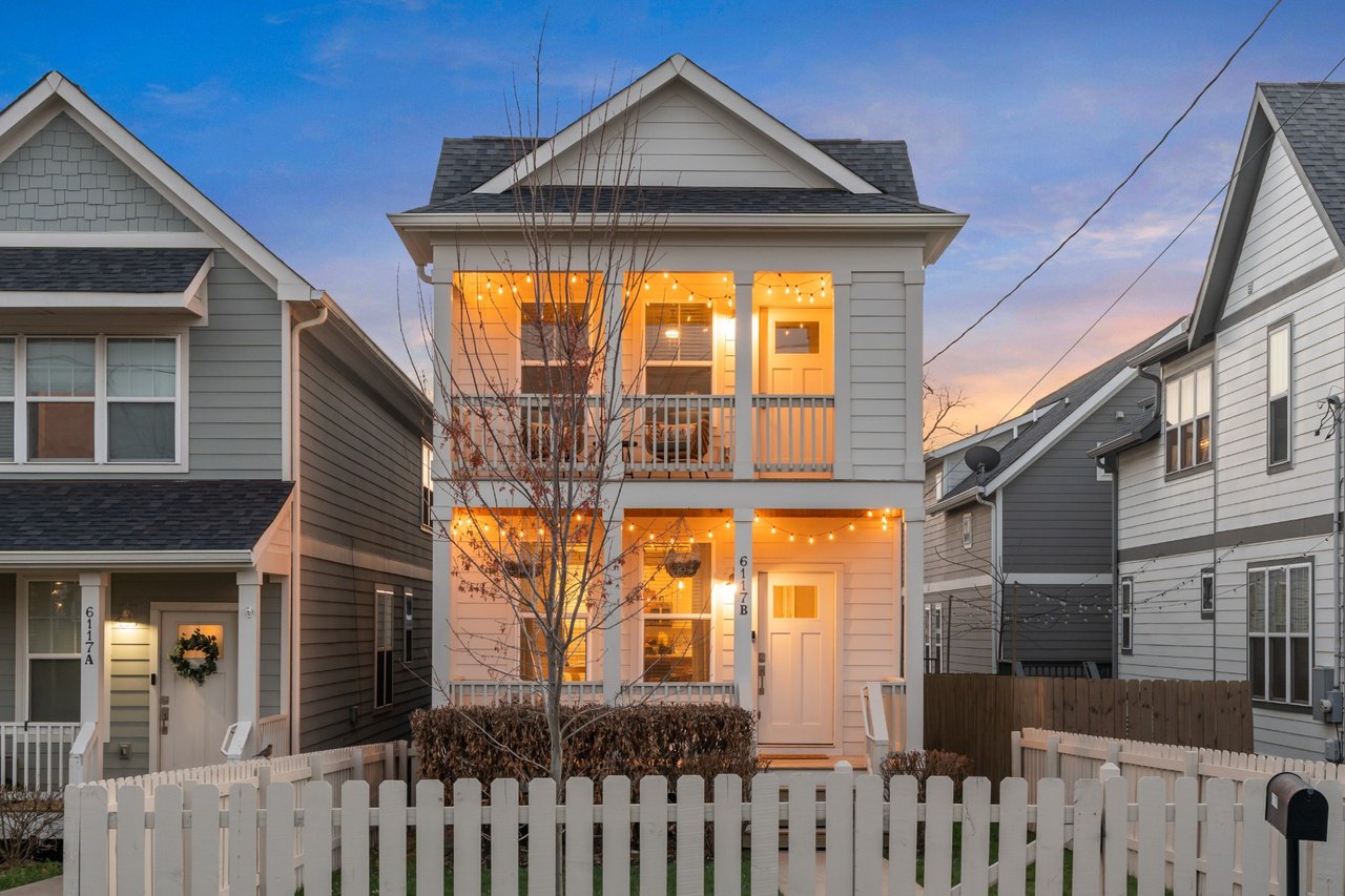 Front exterior of 6117 California Ave #B, Nashville — two-story home at dusk