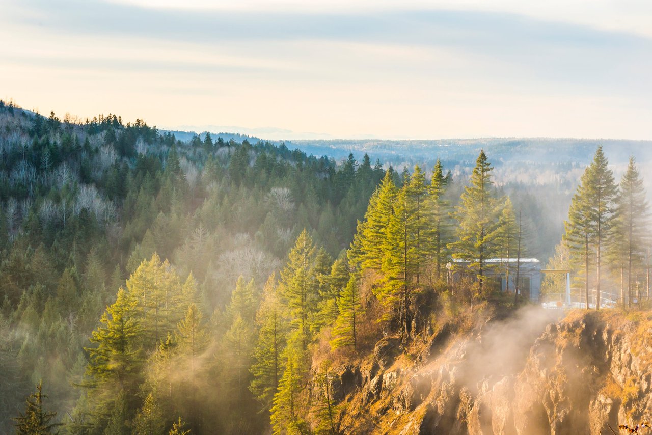 Snoqualmie Falls sunset with fog view outdoors