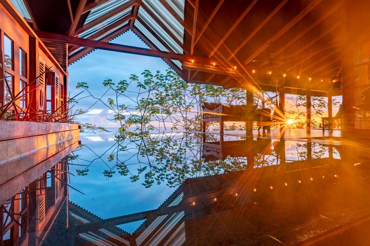A Handcrafted Residence Immersed in Nature Above the Canopy Ocean View Architectural Home