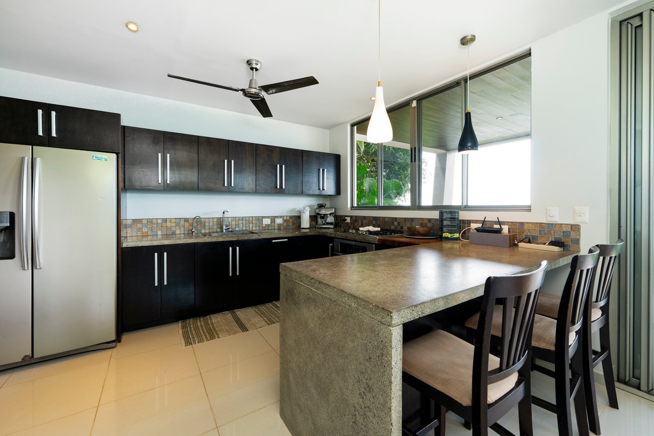 A Modern Jungle Haven with Panoramic Whales Tail Views