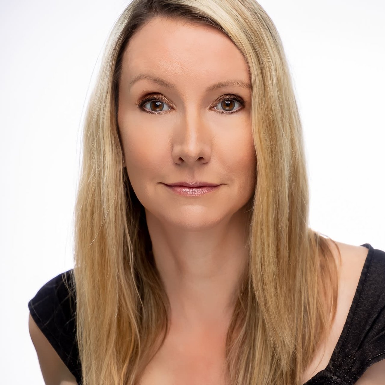 A headshot of Kathleen Provancher who is the lead real estate agent for Team Provancher.