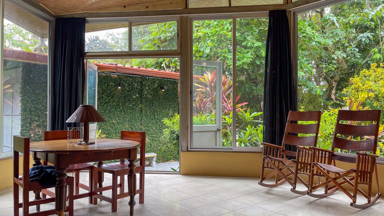 Cozy Colonial Home with Lush Gardens and Prime Commercial Prospects