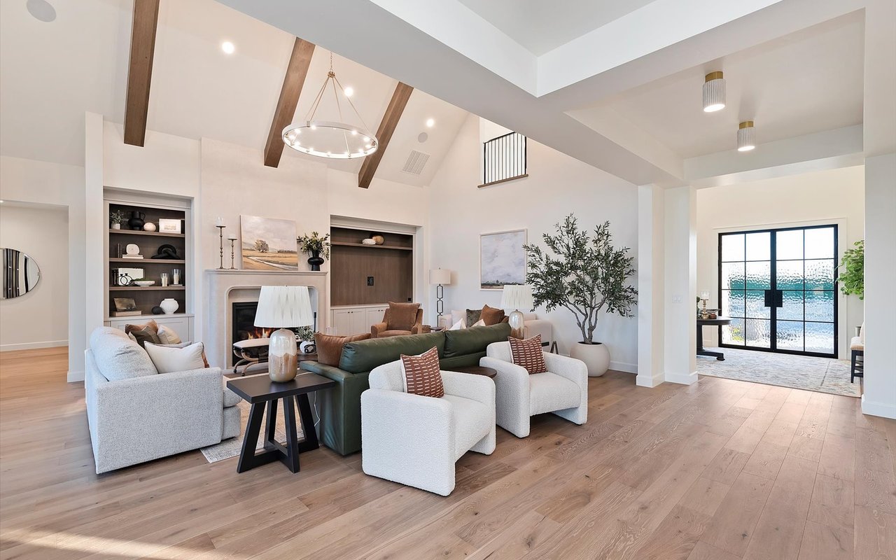 Living room and front entryway - white walls and wide-plank white oak floors