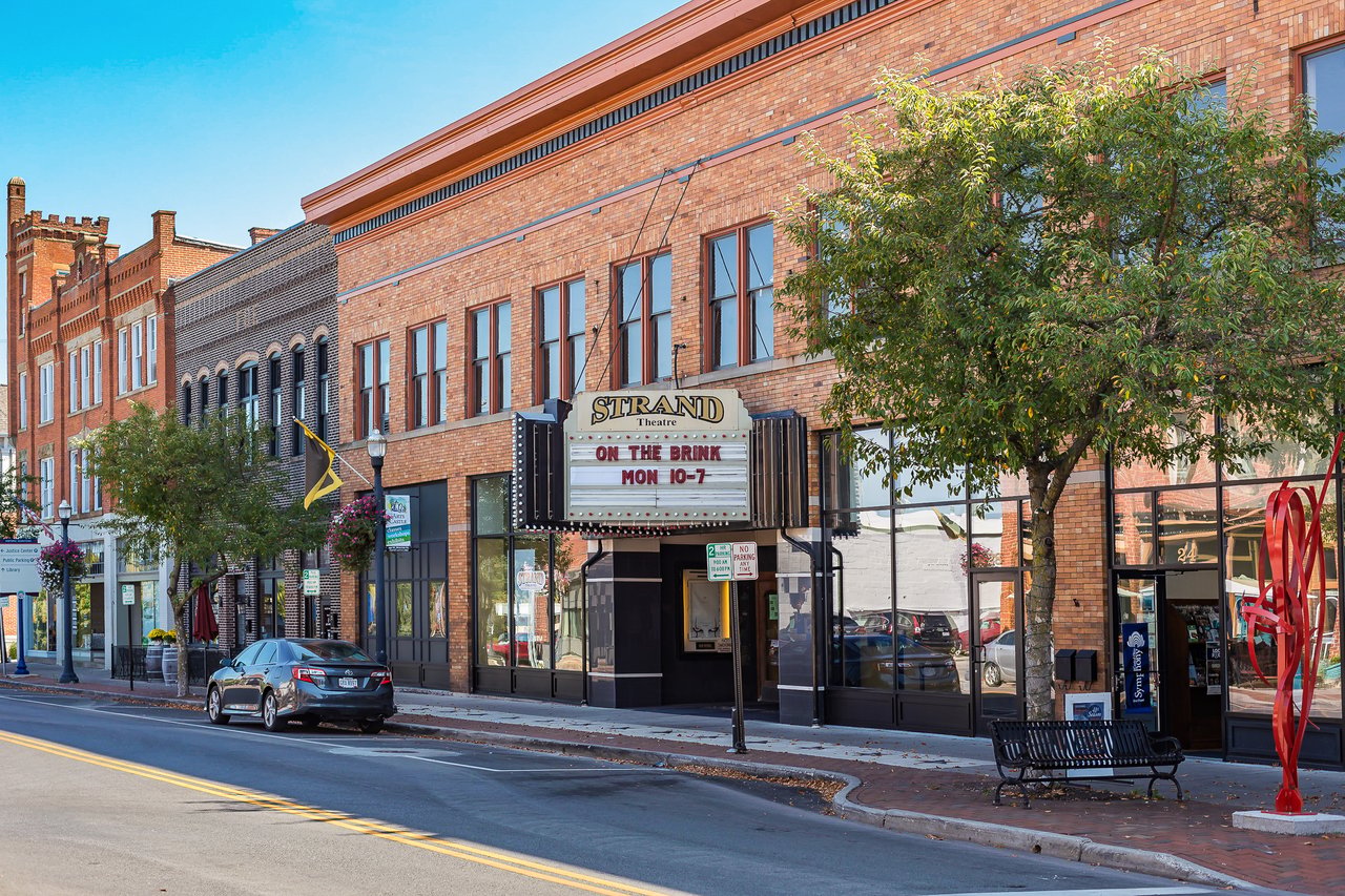 Winter Street storefronts and the Strand Theatre marquee in Downtown Delaware, Ohio