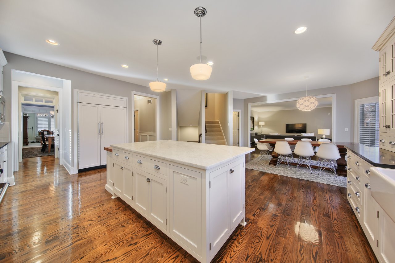 The Tree-lined Street And A Perfectly Manicured Yard Welcome You To The Entry Of The Home