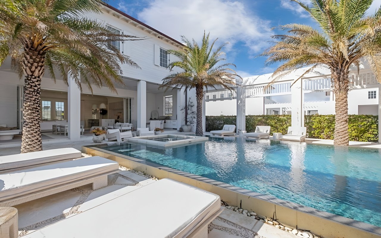 Boutique Home with Striking Pool Courtyard and Carriage House