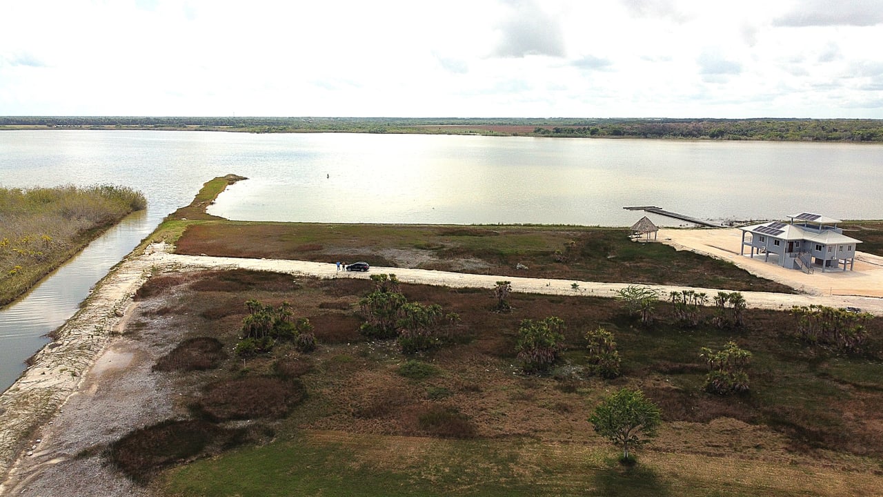 Vacant waterfront lot in a luxury master-planned gated residental community in northern Belize