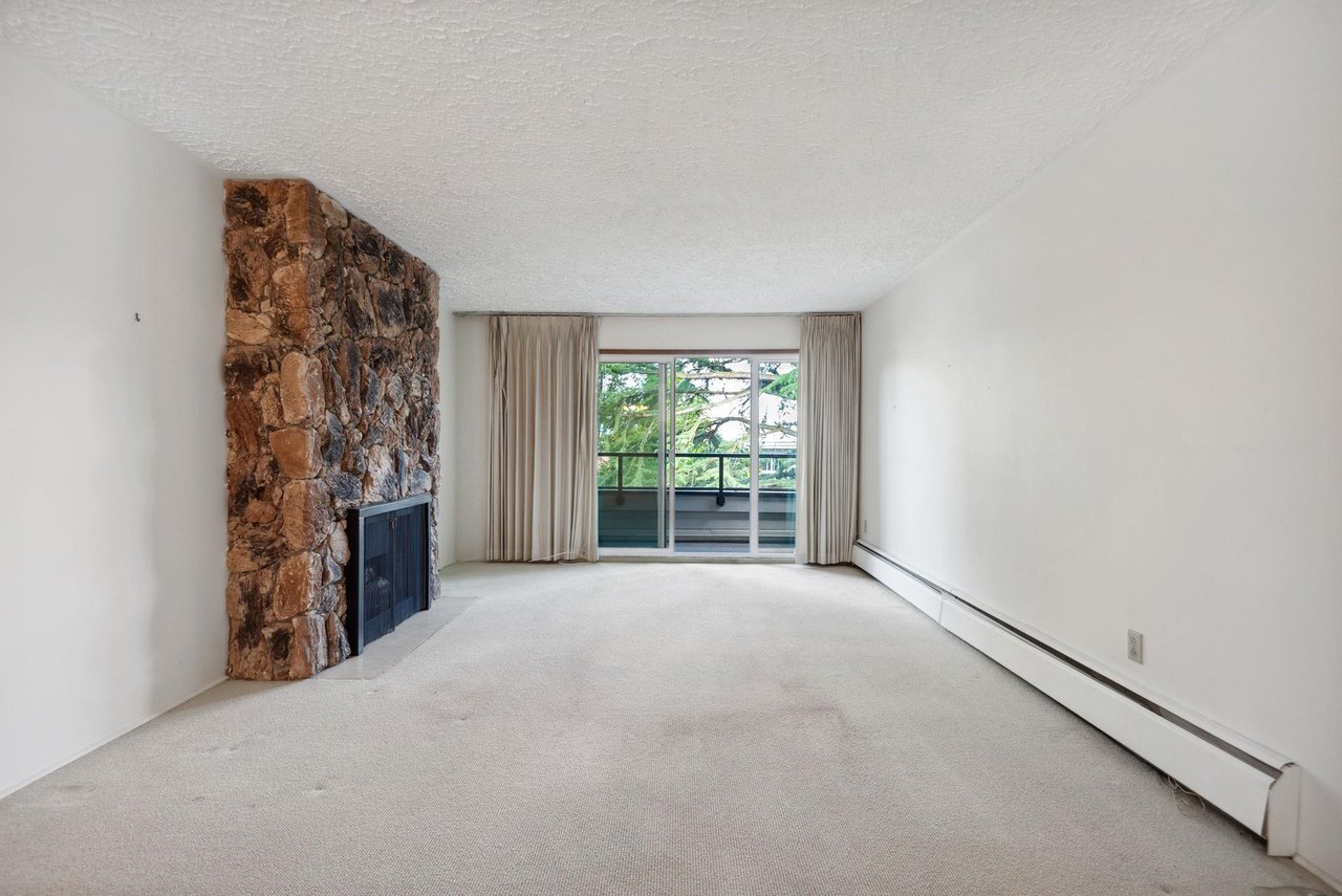 303-1266 W 13th Ave