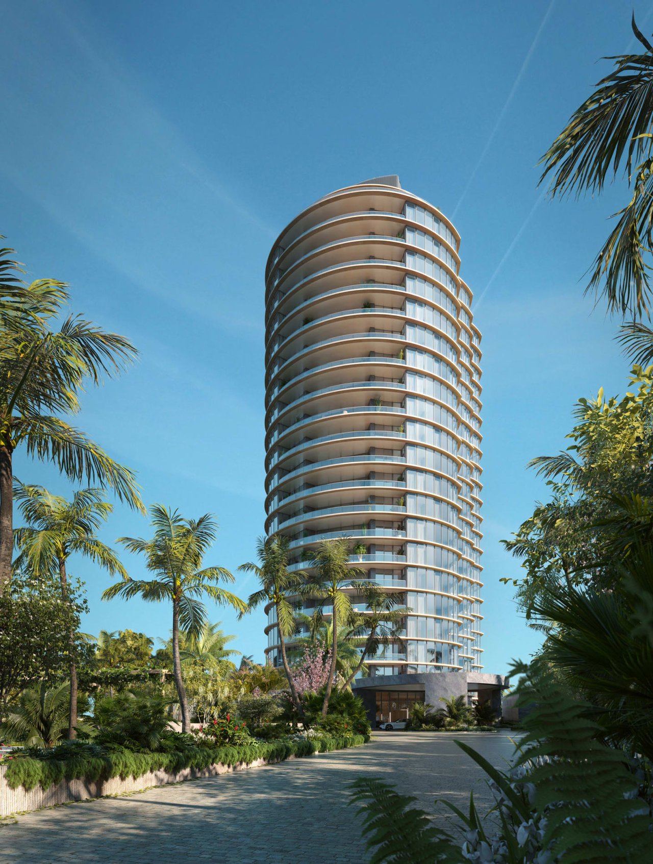 Rivage Bal Harbour residential tower with curved balconies rising above tropical landscaping.