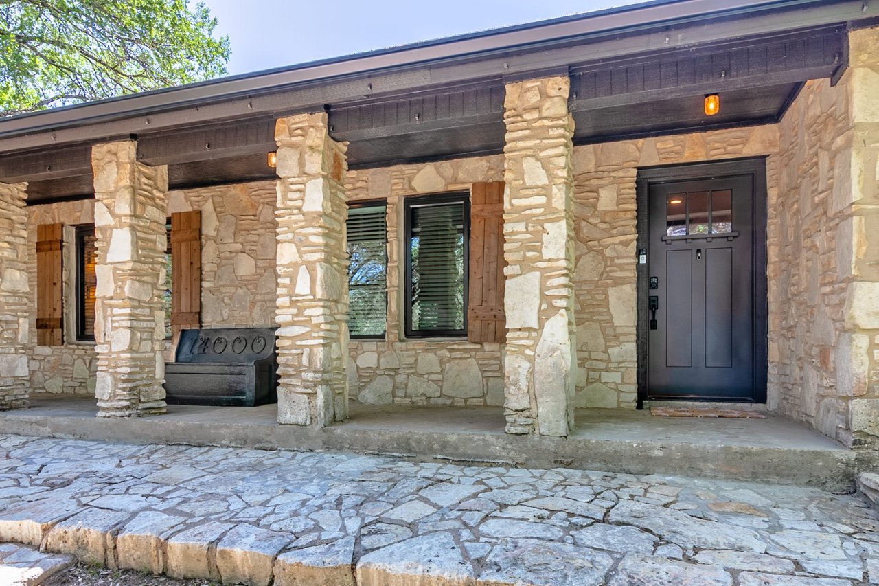 Updated, unrestricted Hillcountry Gem nestled in the Live Oak Trees