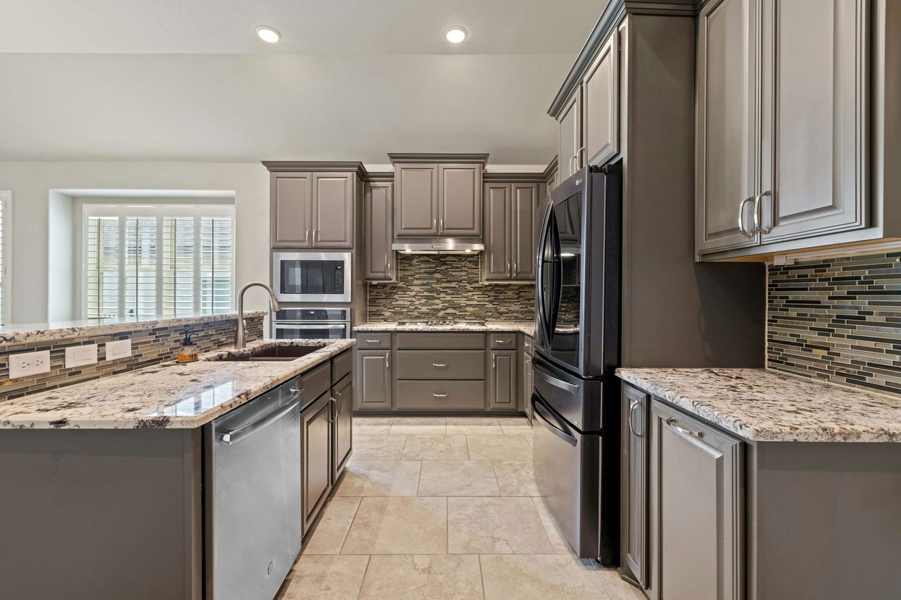 Impeccably Maintained 1-Story Taylor Morrison Home with Luxurious Amenities in Desirable Travisso Neighborhood!