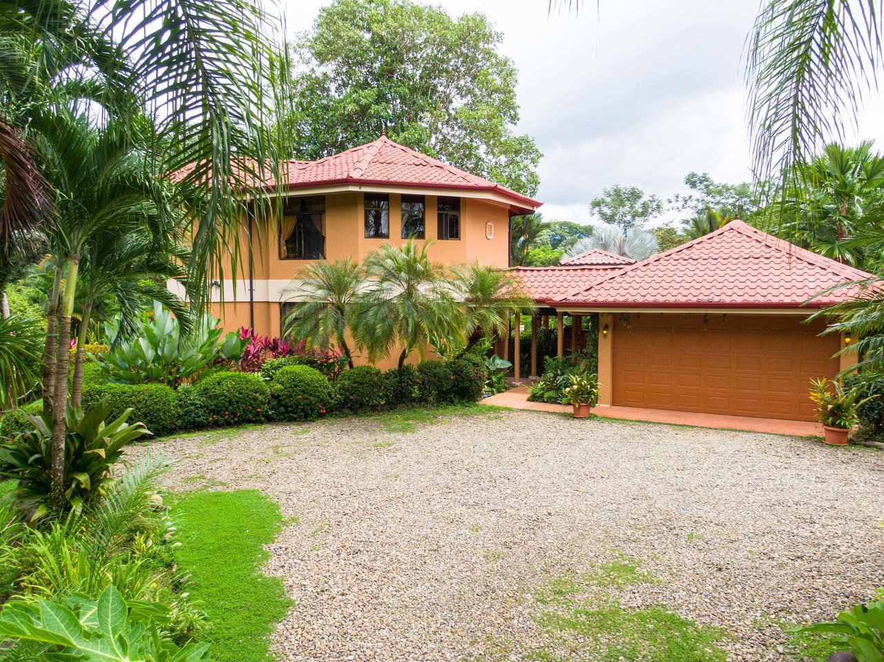 Stunning Tropical Home in Gated community with Hundreds of fruit trees  