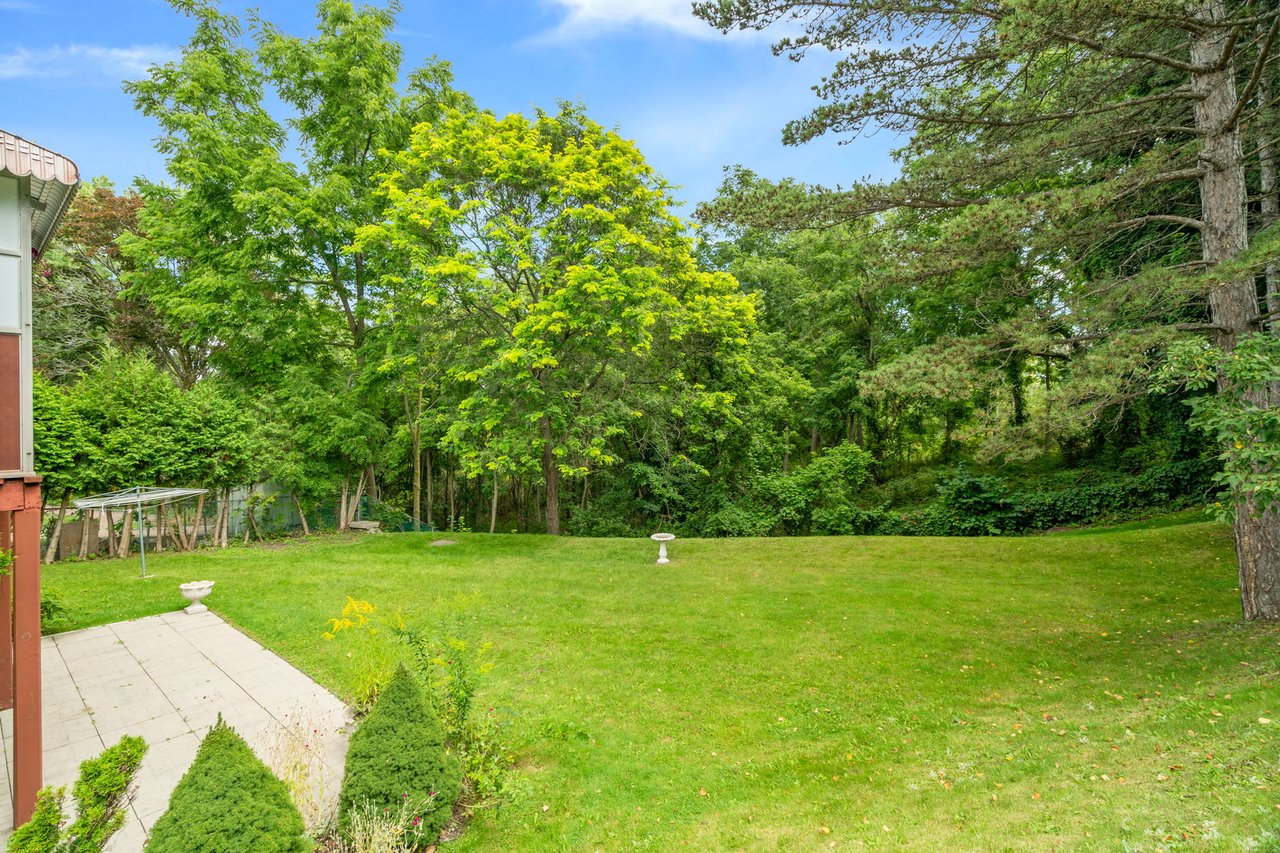 SOLD: Coveted Bayview Woods