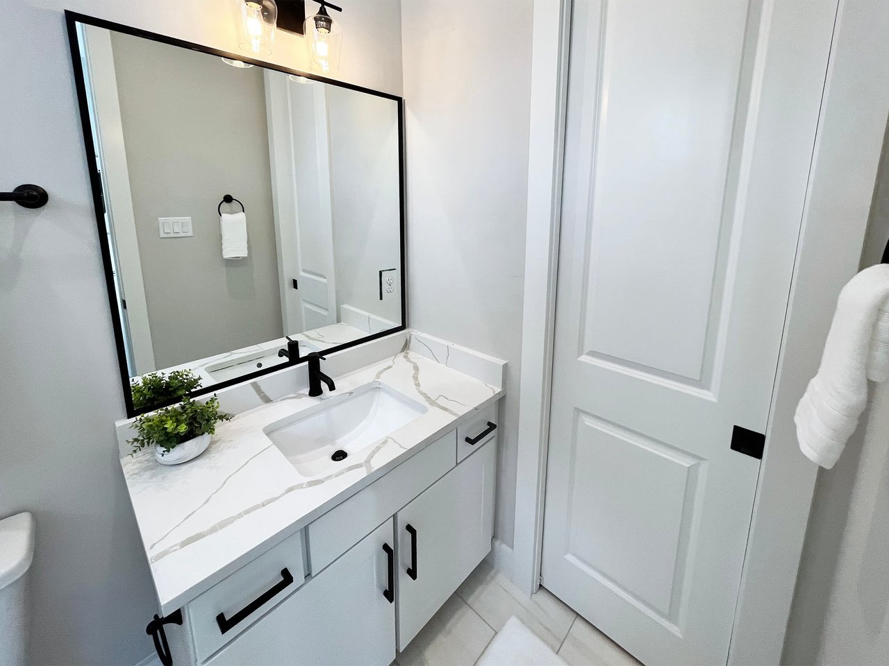 bathroom with a white vanity 