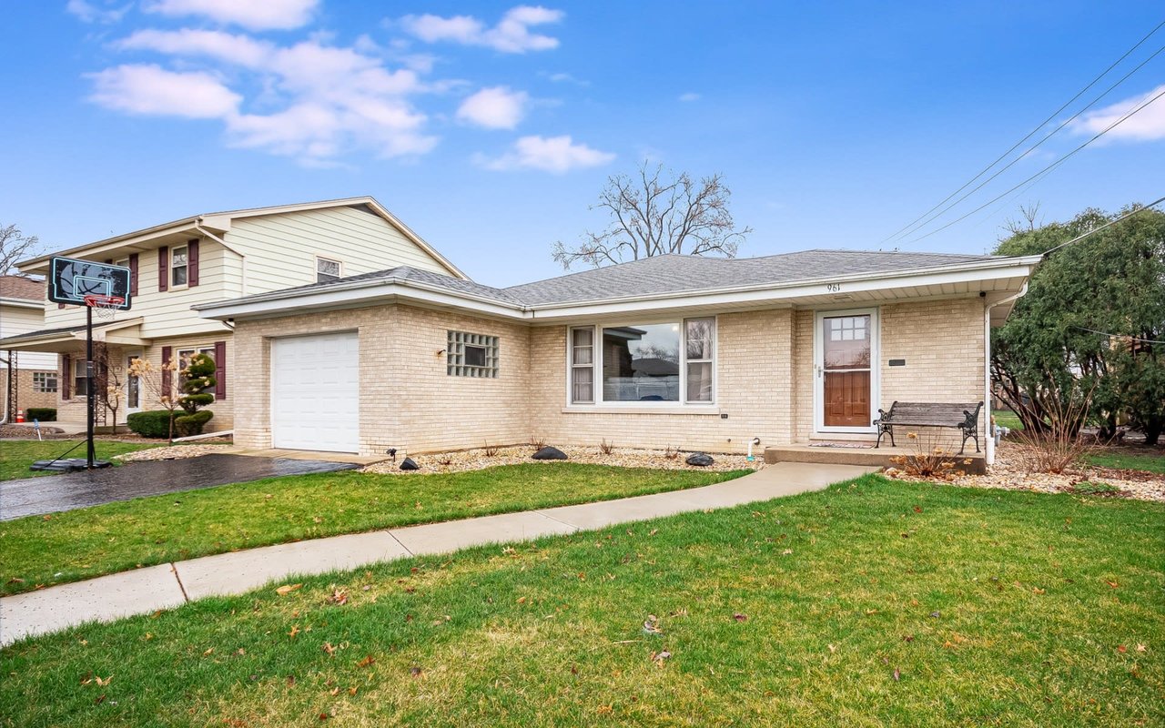 A Stunning and Updated All White Brick Ranch Home in The City!
