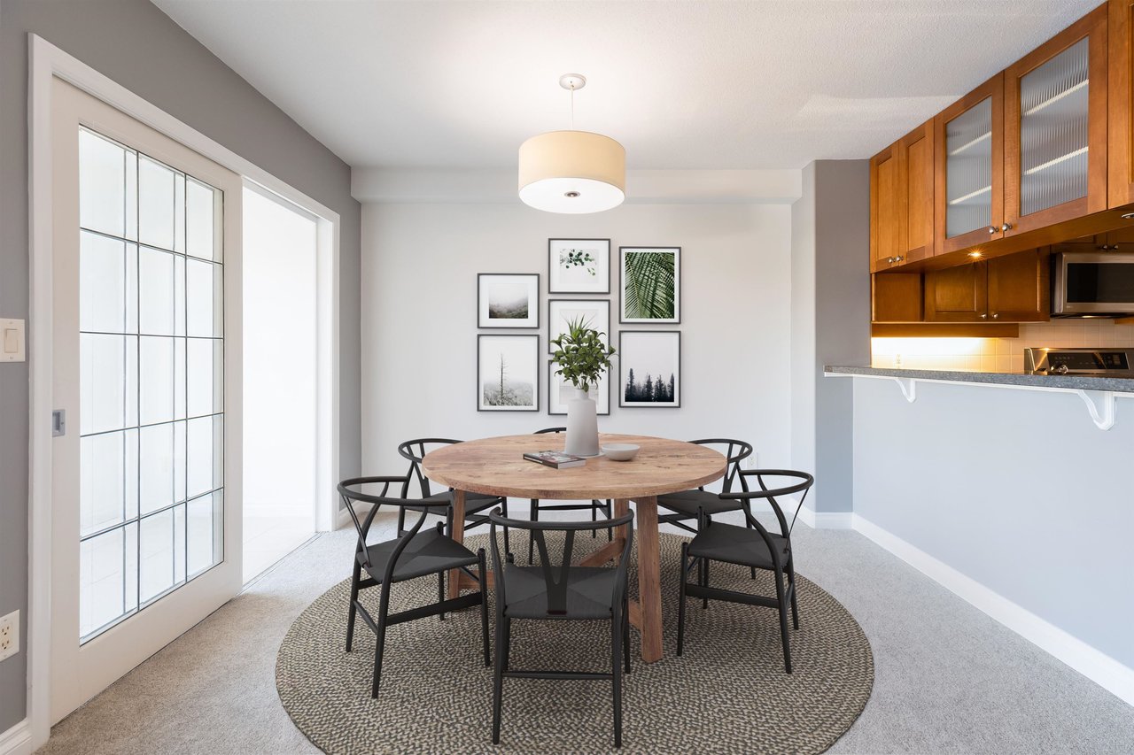 203-4542 W 10th Ave