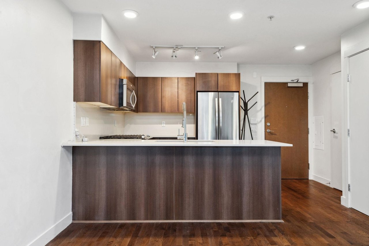 107-7088 14th Ave