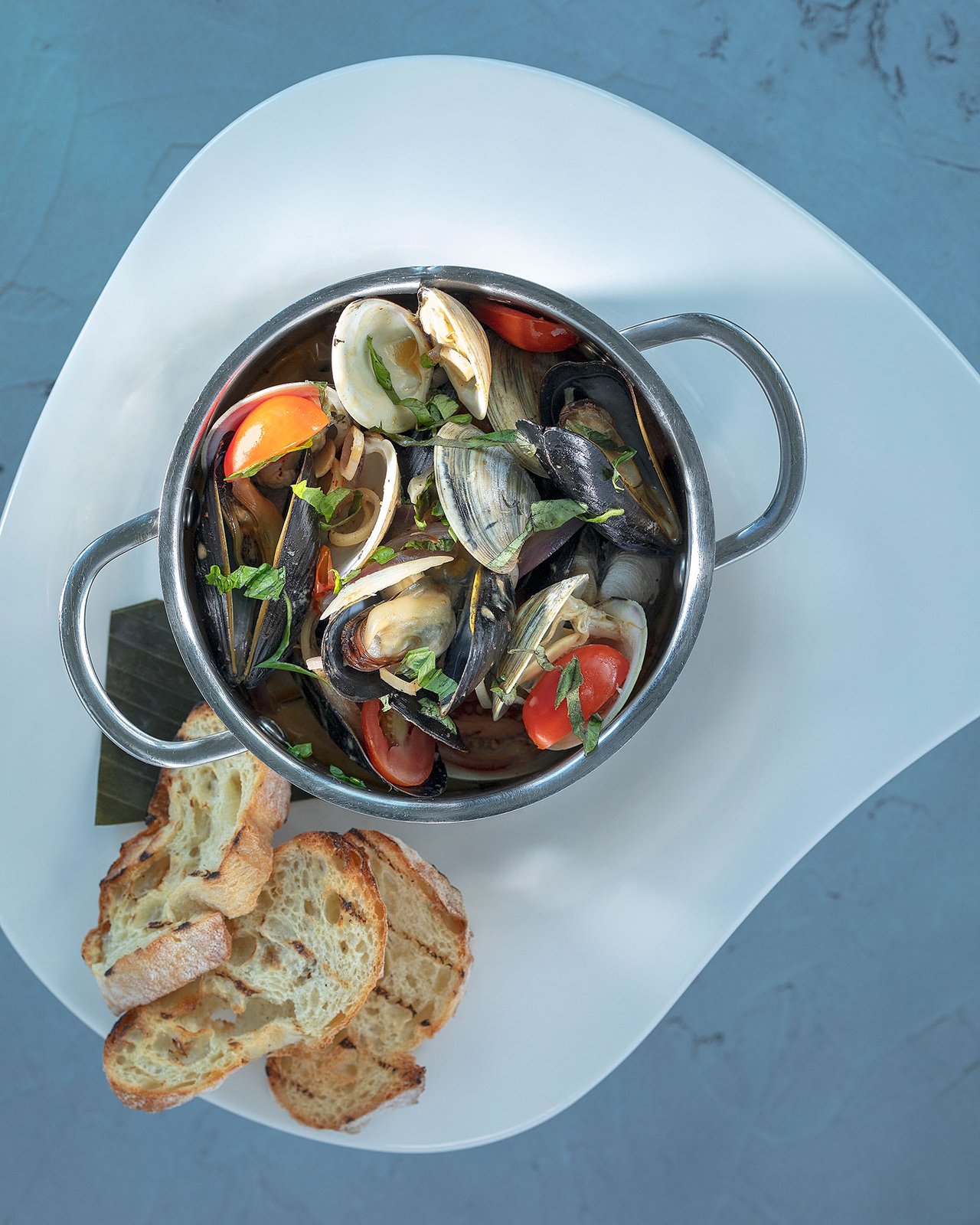 A dish from Pescado in Rosemary Beach featuring mussels and clams. 