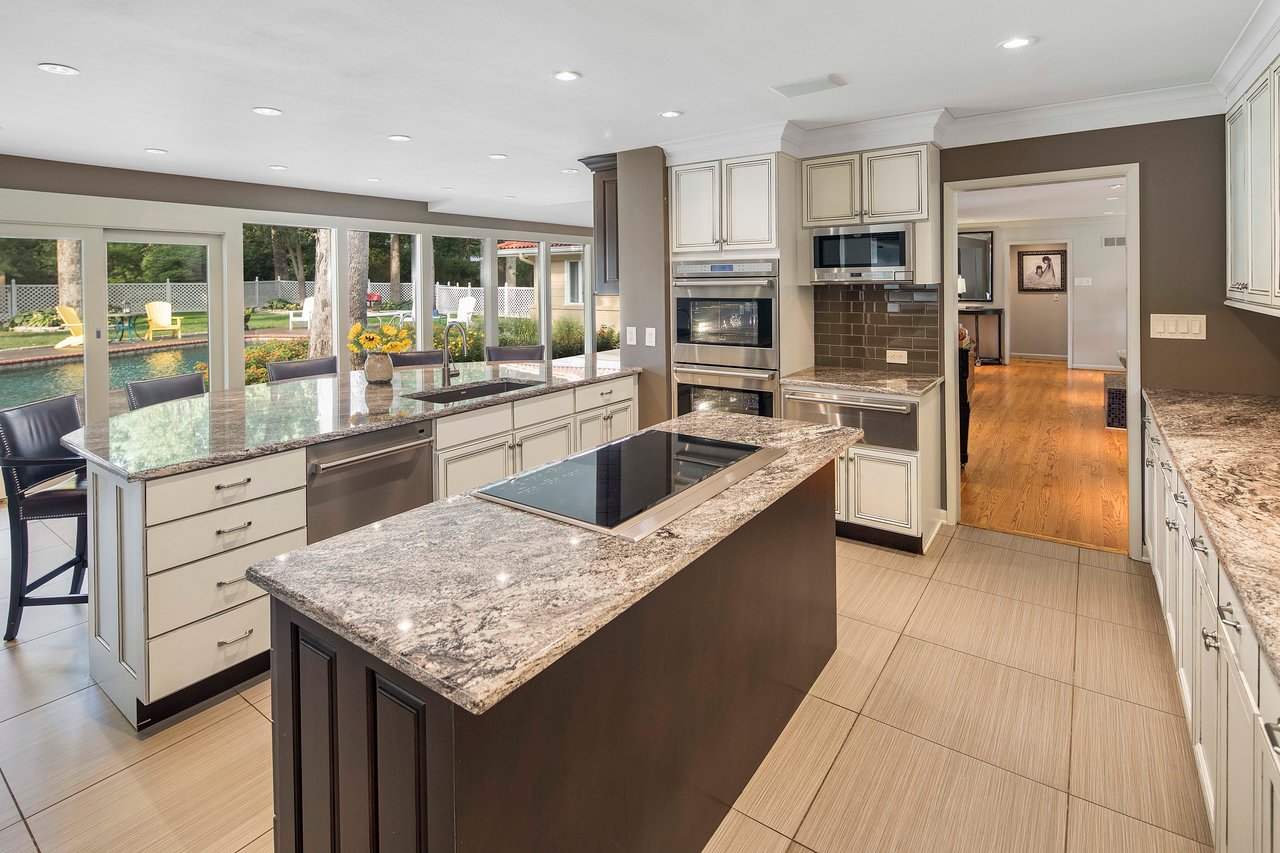 A Special Retreat on a Prized One Acre Lot With Pool and Tennis Court