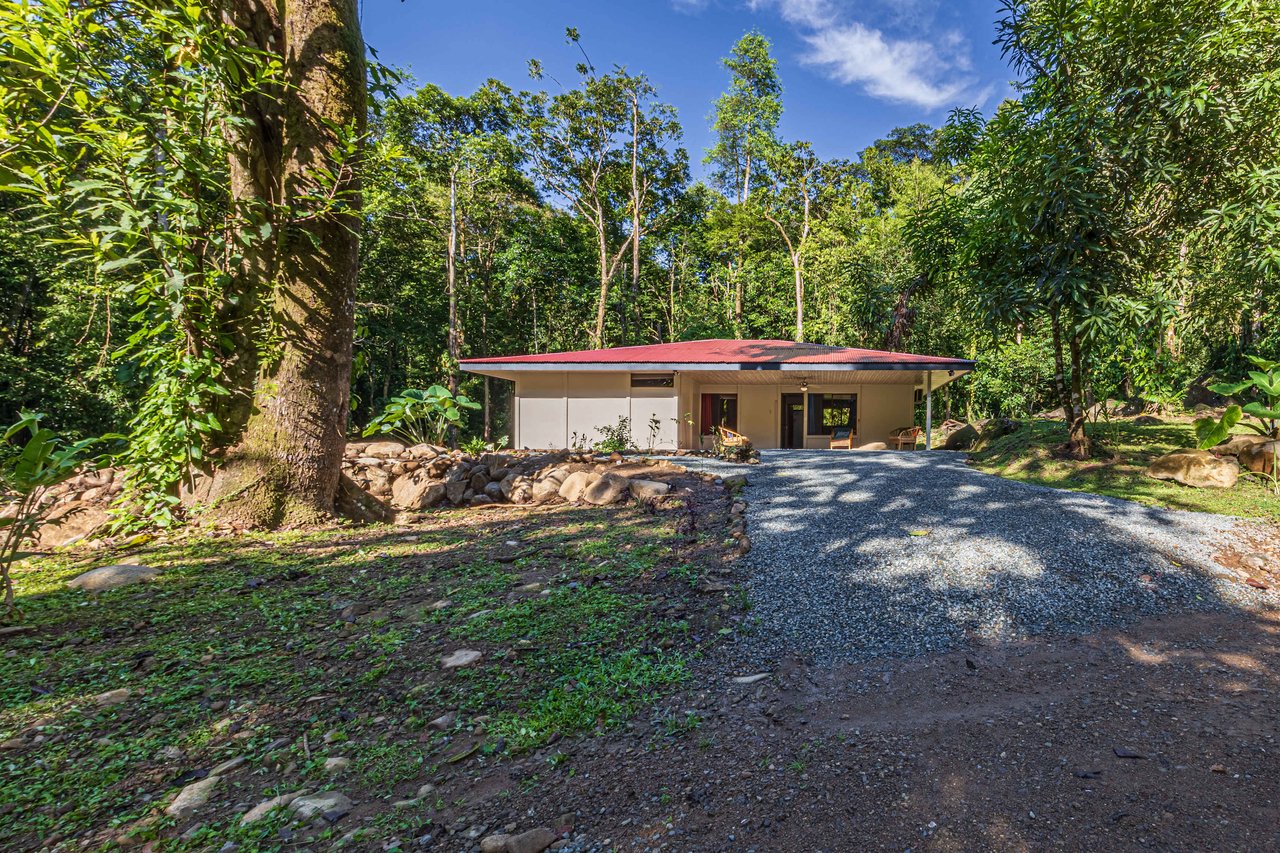 Versatile Riverfront Retreat: 5.3 Acre Rare Gem with Multiple Homes 