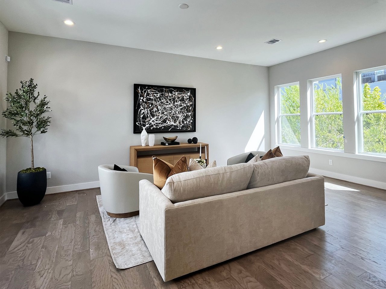 living room with a large gray couch 