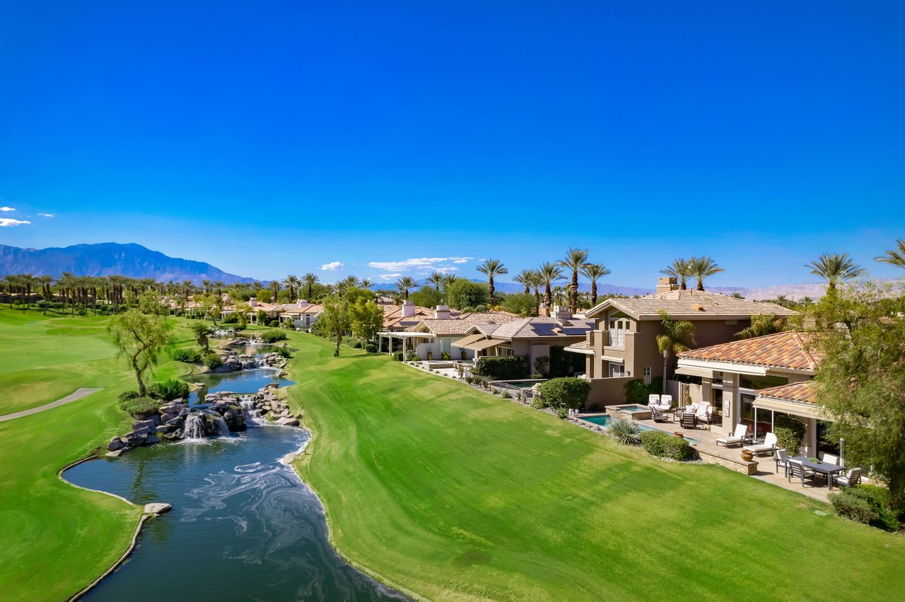 An aerial view of a luxury golf course community