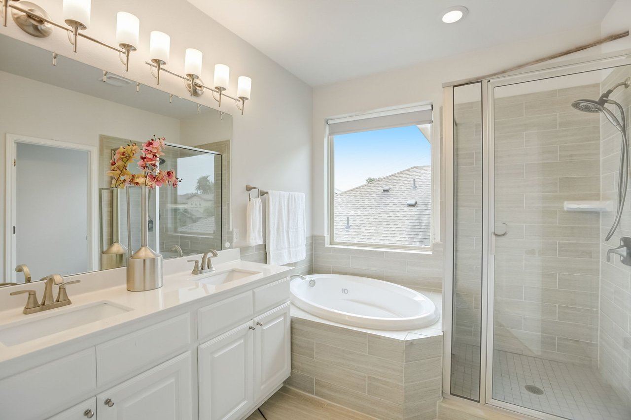 Spacious 4-Bedroom Home in The Preserve at Four Points – A+ School District, Open Floorplan, Luxurious Primary Suite, Covered Patio, and More!