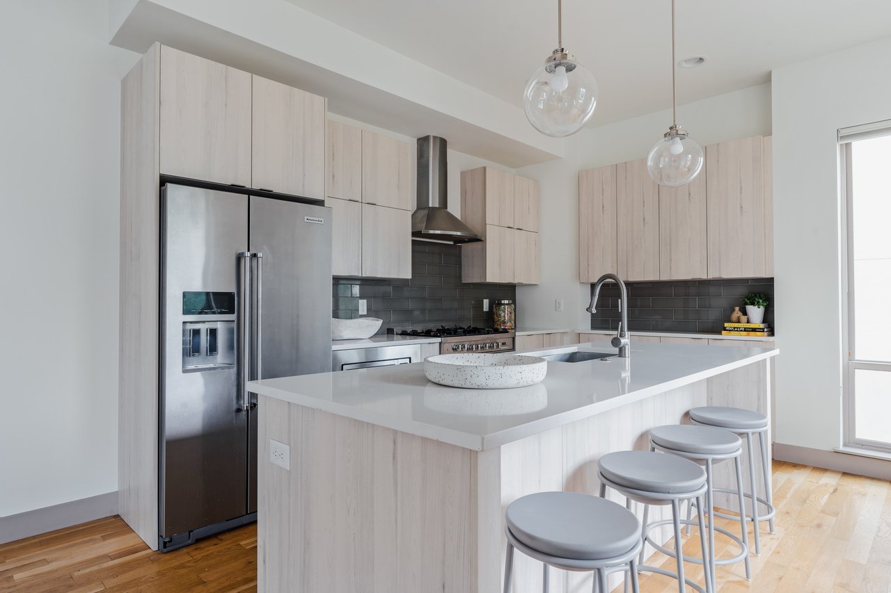 Check it out! Tastefully updated Five Points townhome