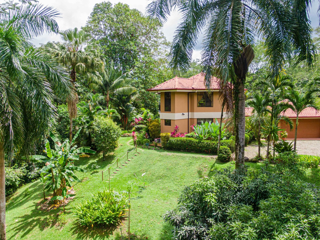 Stunning Tropical Home in Gated community with Hundreds of fruit trees  