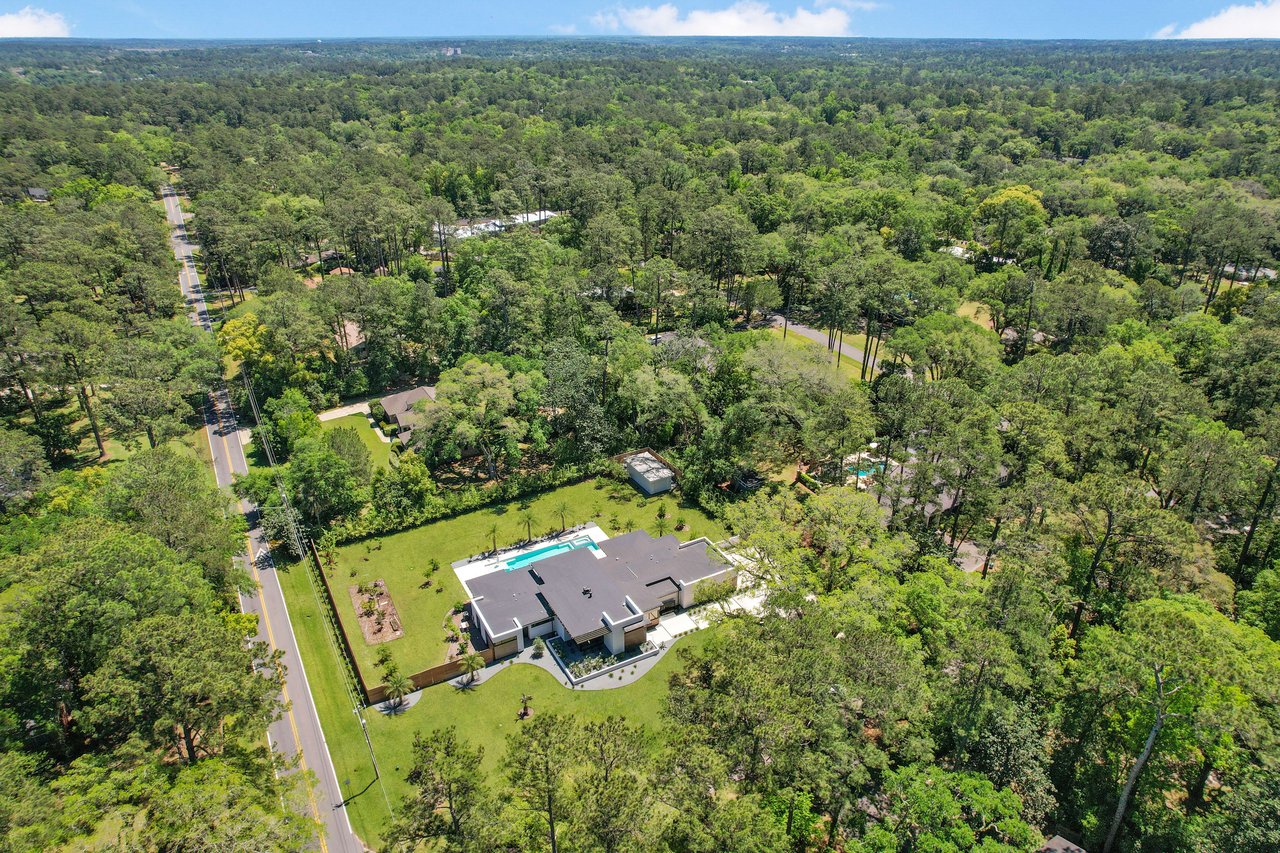 An aerial view of a specific area within the Piedmont Live Oak neighborhood, highlighting houses and green spaces.