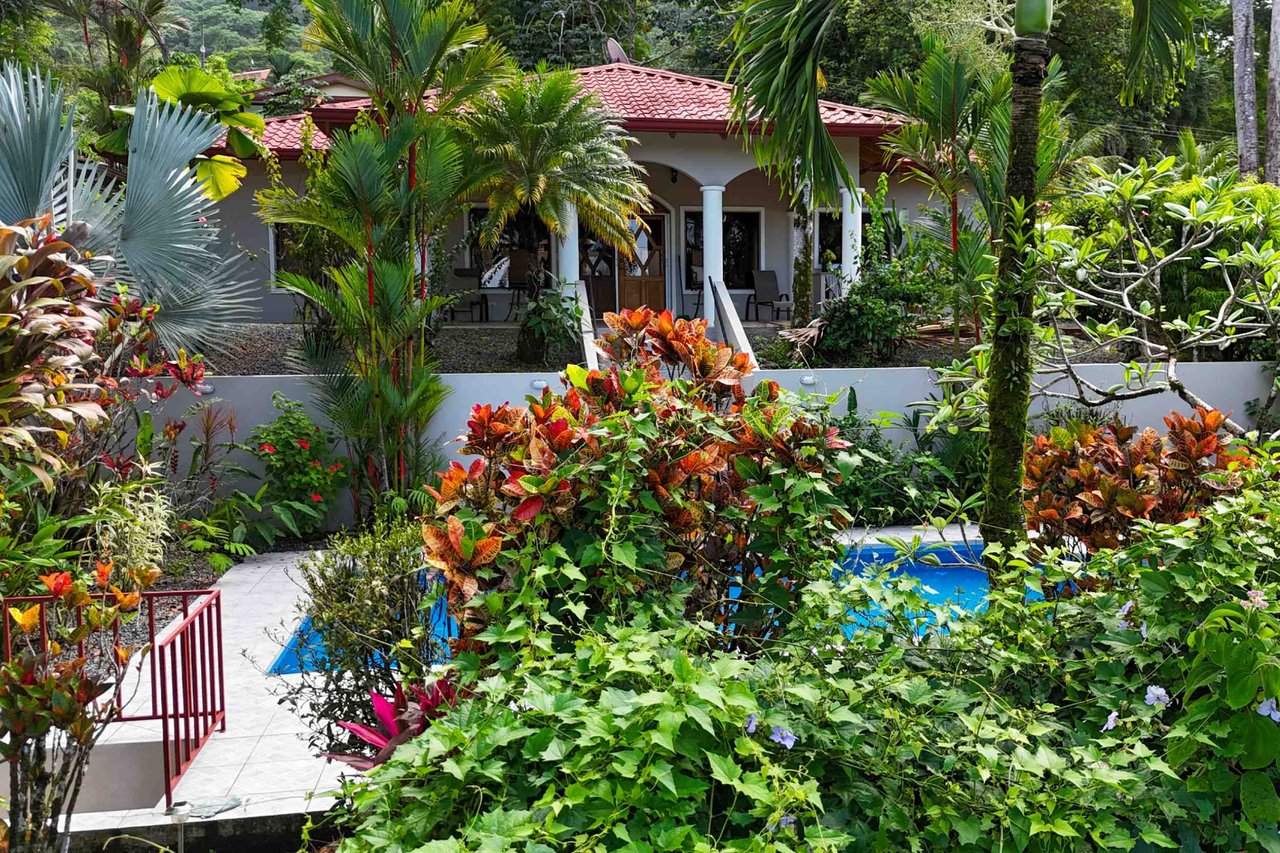 Turnkey Spacious Home with Open Layout, Pool & Small Ocean View in Ojochal Gated Community