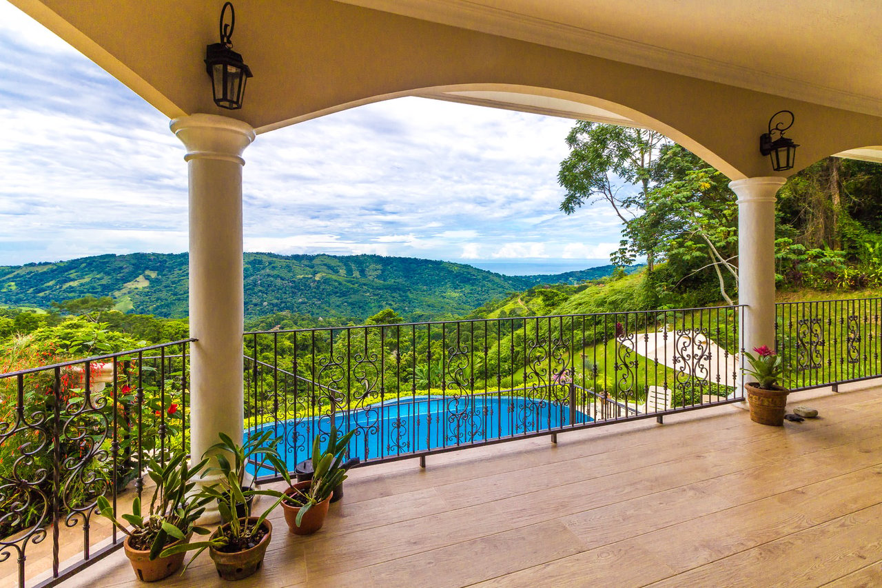 Beautiful 4500 sq ft home on 3.5 acres, gated community, expansive ocean, valley, and jungle views!