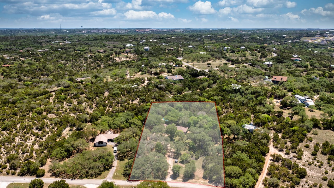 Updated, unrestricted Hillcountry Gem nestled in the Live Oak Trees