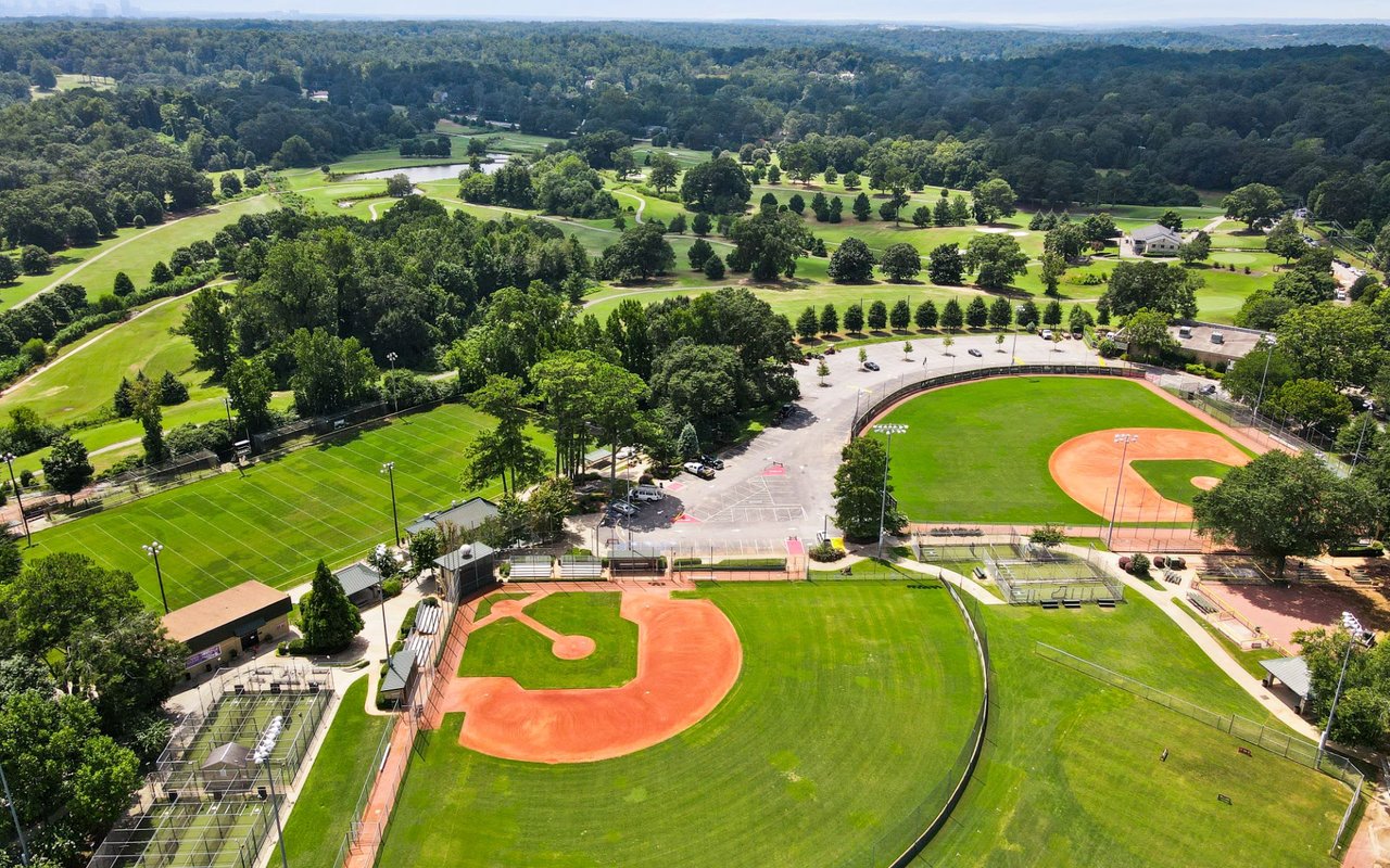 Aerial view of a baseball field and golf course