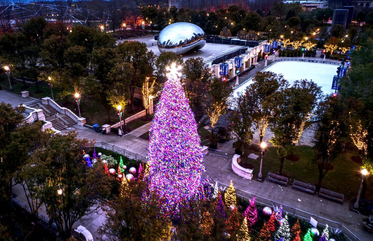 Chicago Christmas Tree in Millennium Park surrounded by ultra luxury homes