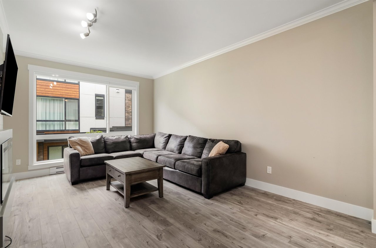 212-16488 64 Ave