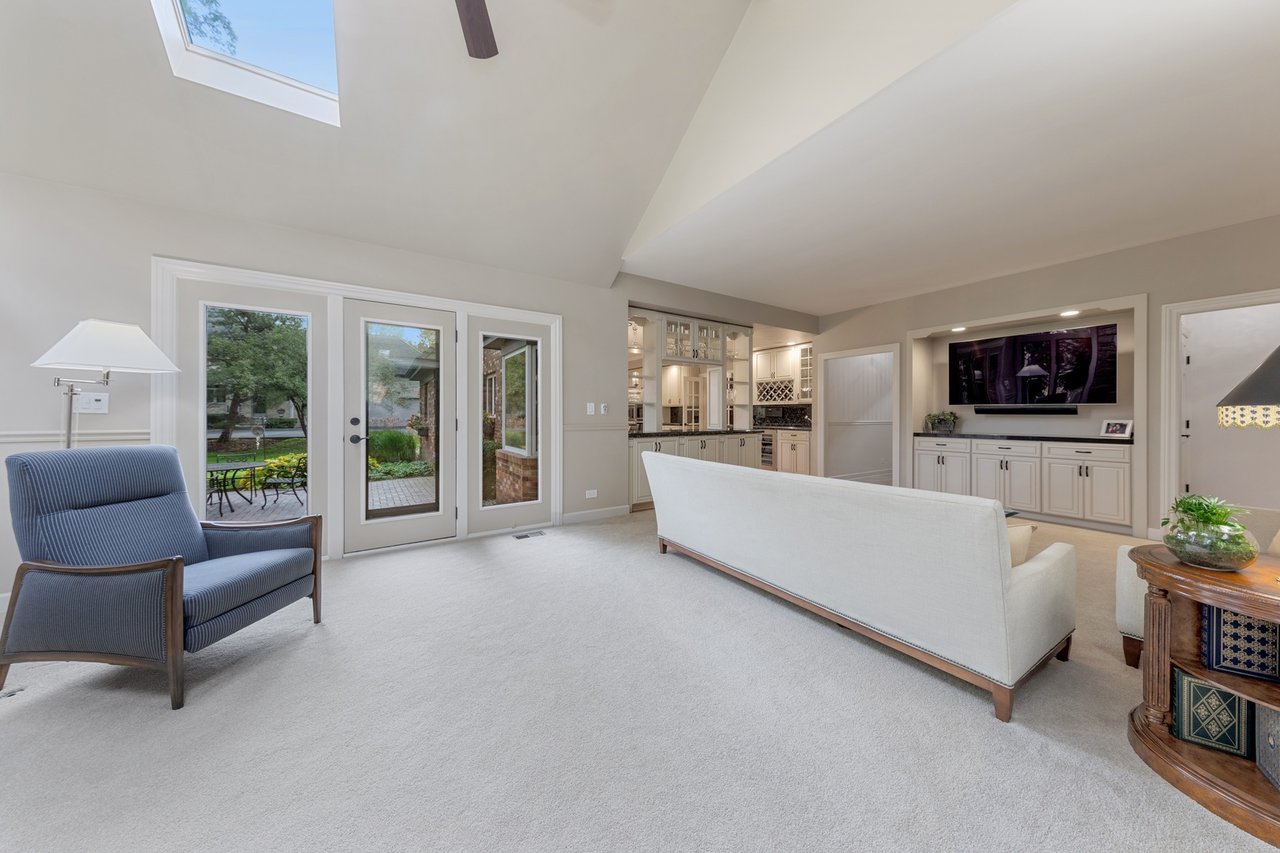 Beautifully Appointed Home in a Gated Community on Over an Acre of Professionally Landscaped Grounds with Pond Views