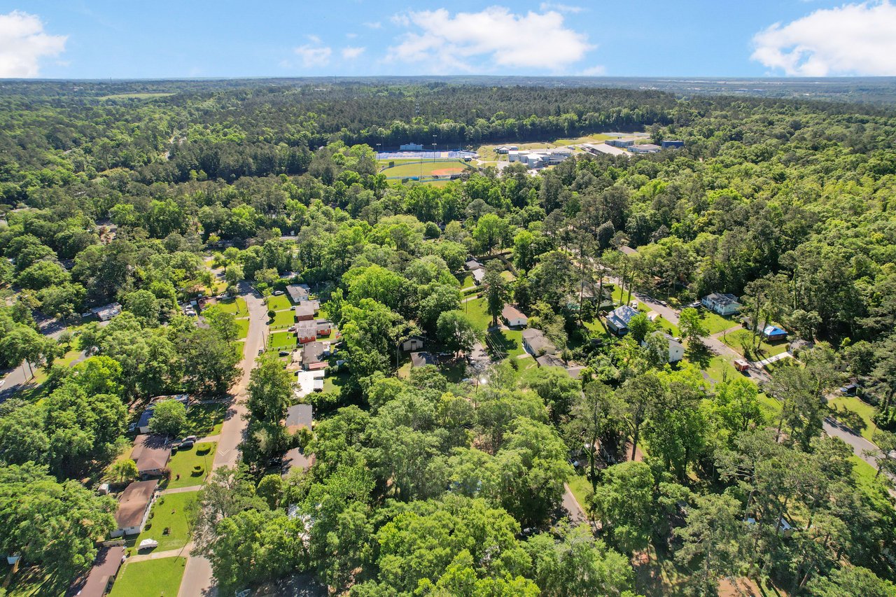 Another aerial view of the recreational area within Apalachee Ridge Estates, highlighting the pool and surrounding facilities.