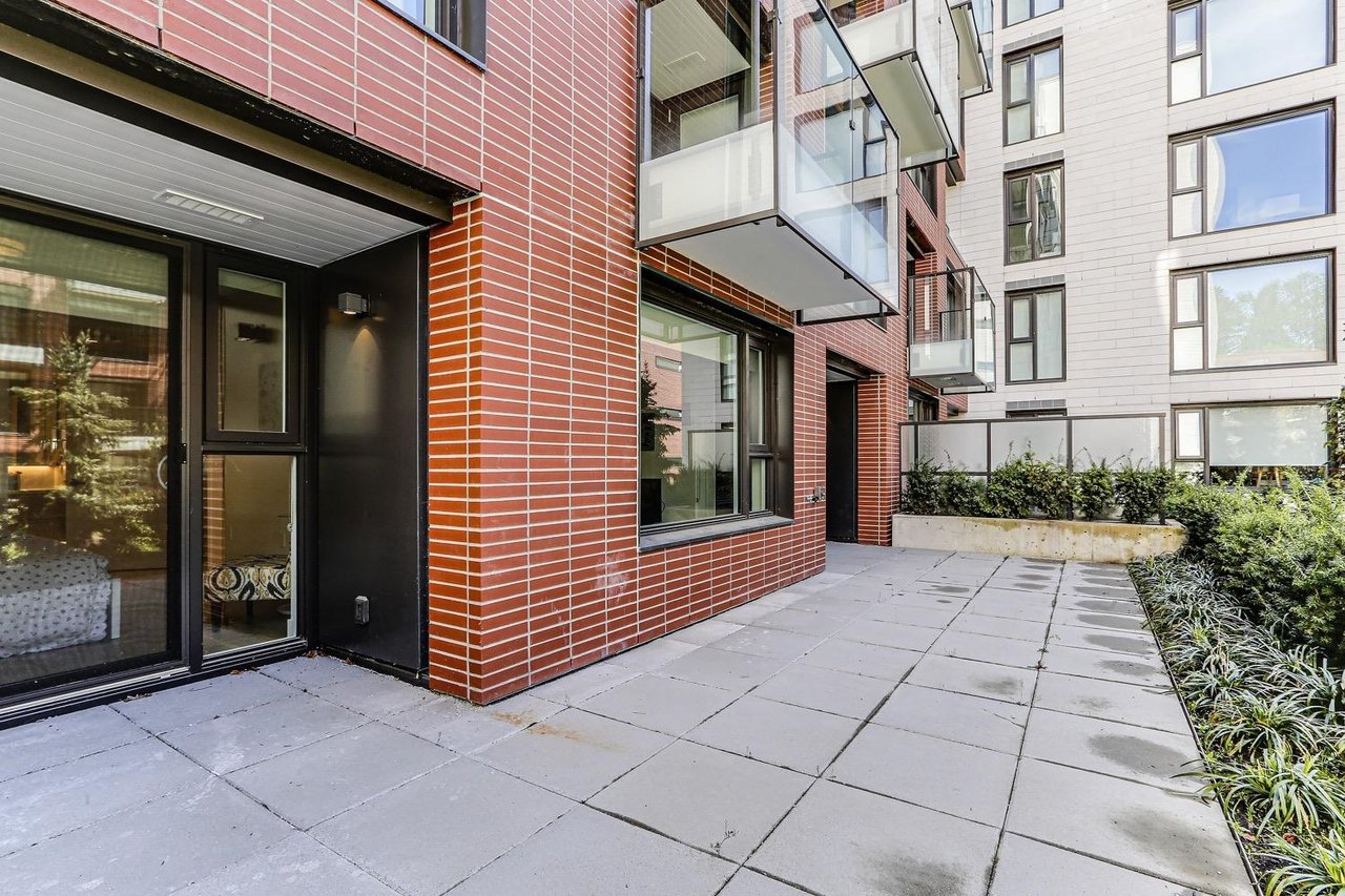 703-1561 W 57th Ave