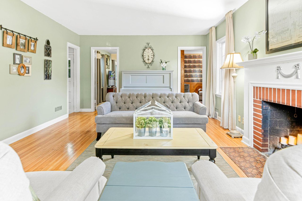 formal living room with fireplace in a St Louis Park MN home sold by A Good Life Group real estate team 