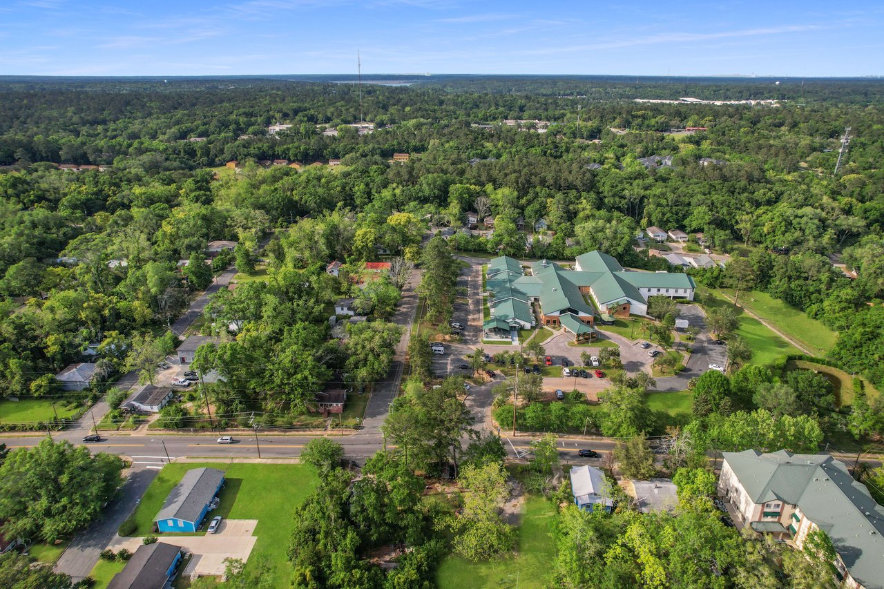 An aerial view of the Griffin Heights community, showing houses, streets, and surrounding greenery.