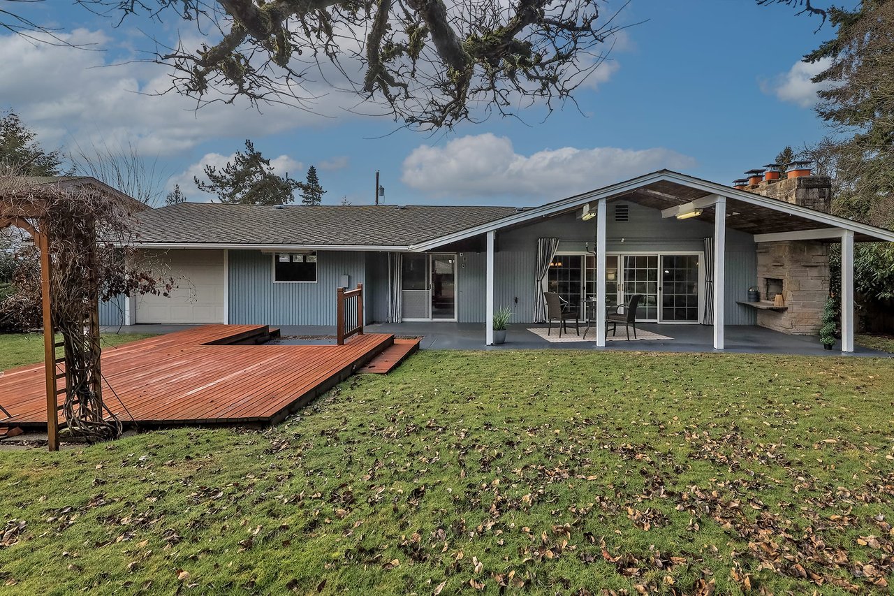 Step outside and explore the private backyard, a serene retreat offering a perfect blend of relaxation and outdoor enjoyment.