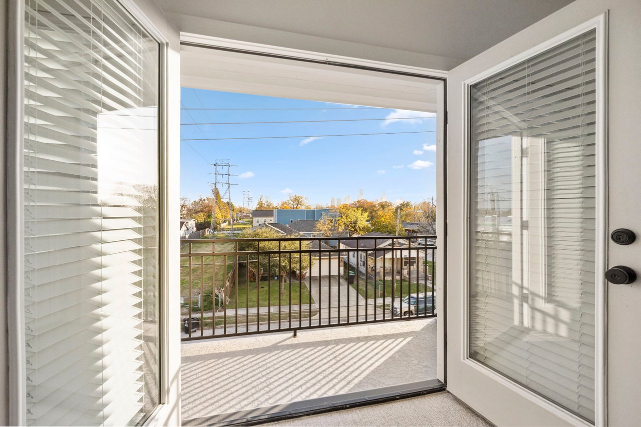 balcony doors and balcony on an Eastwood Estates home 