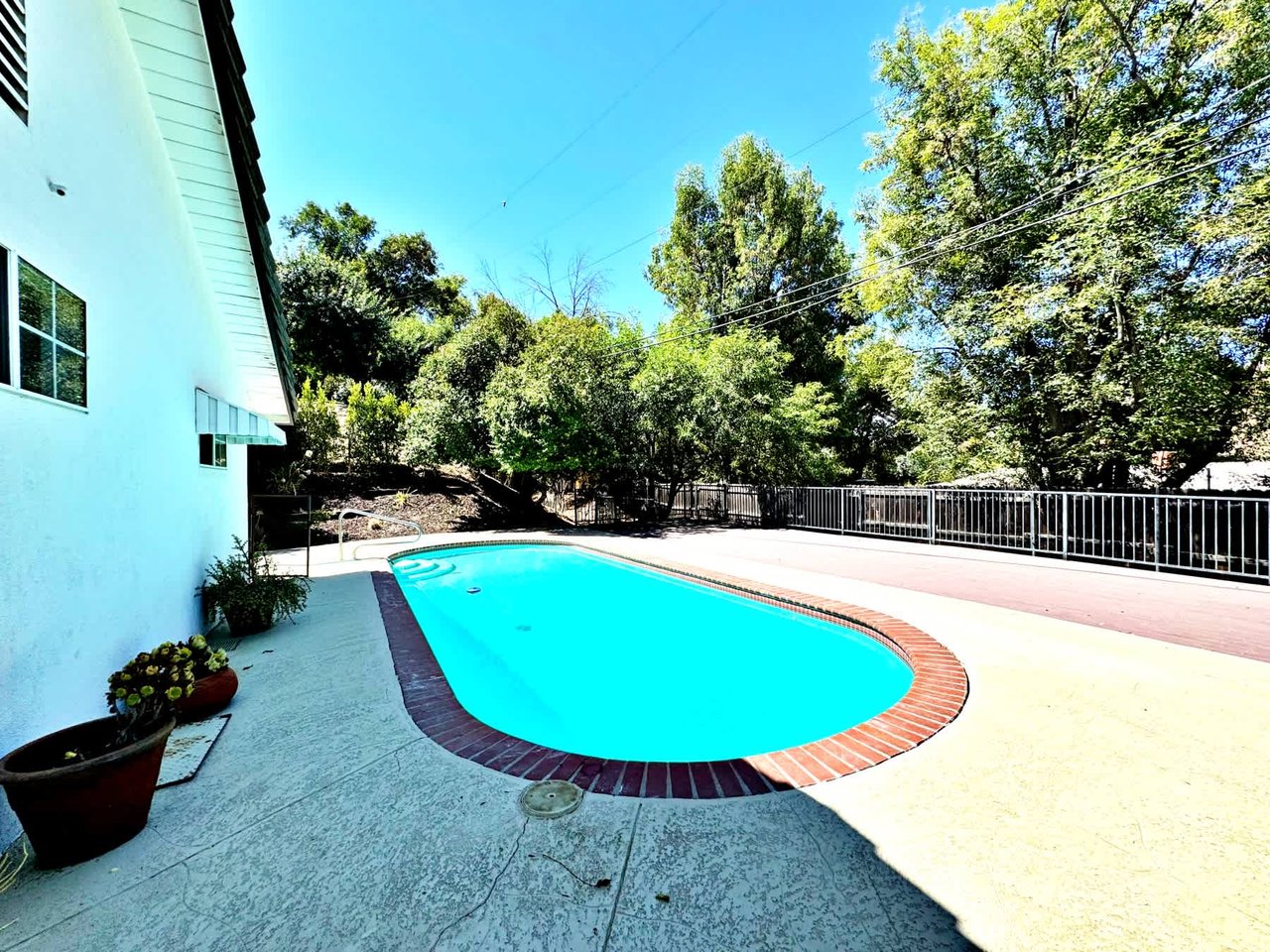 Pool Home In A Highly Sought-After Pocket of Woodland Hills