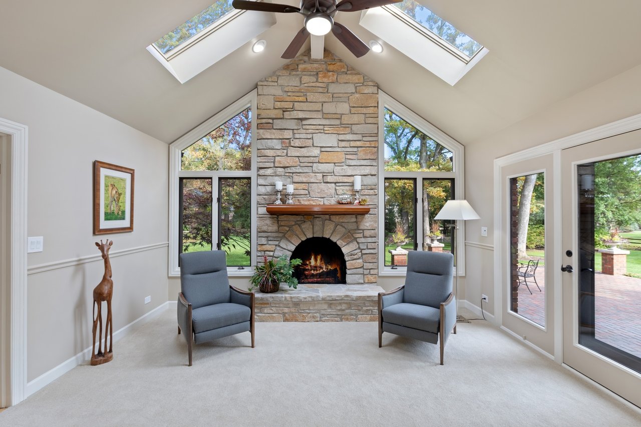 Beautifully Appointed Home in a Gated Community on Over an Acre of Professionally Landscaped Grounds with Pond Views