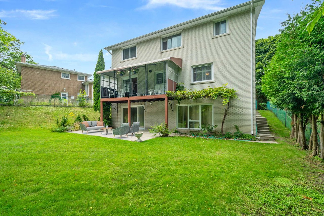 SOLD: Coveted Bayview Woods