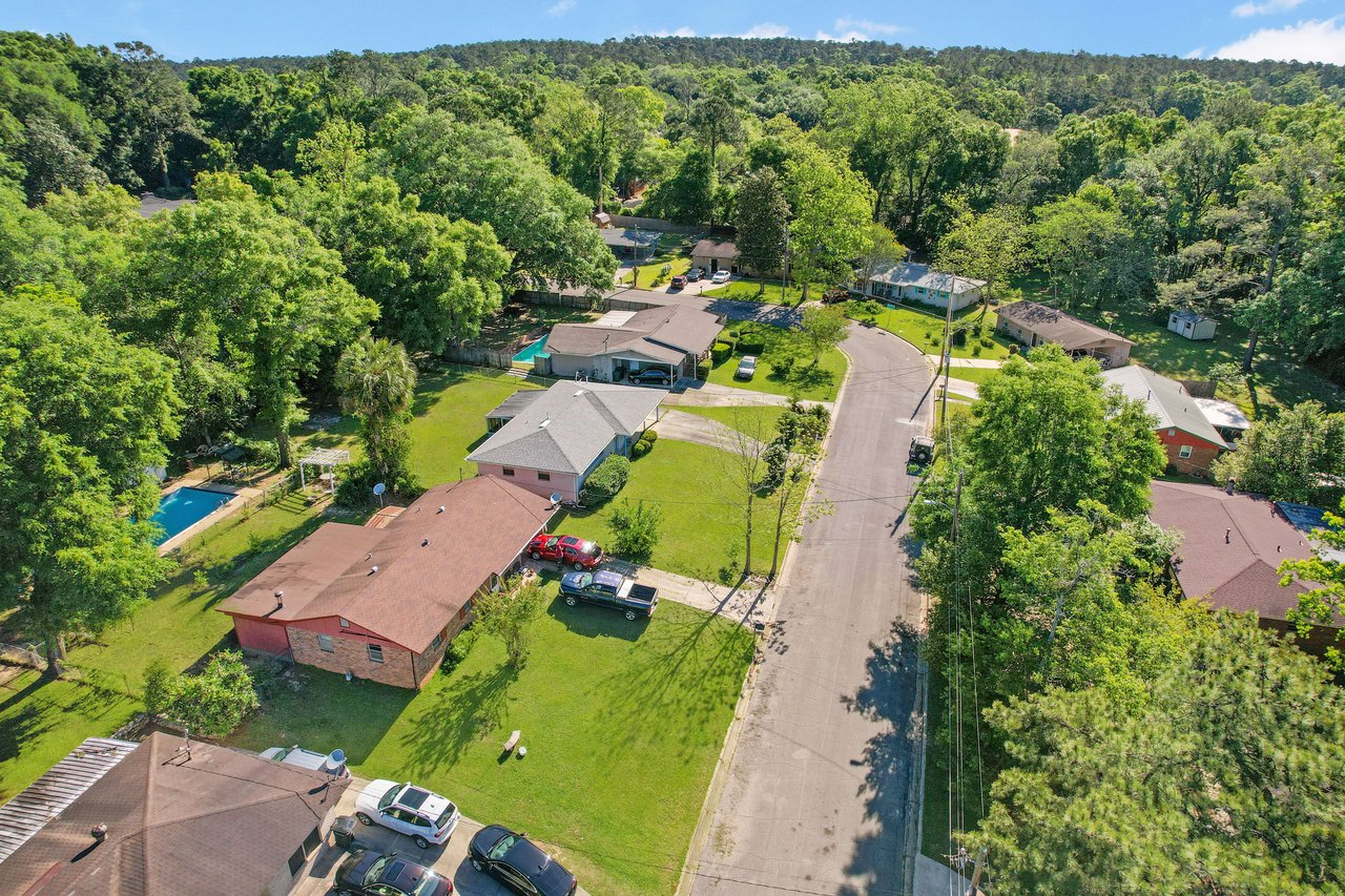 An aerial view of the Beacon Hill neighborhood, showcasing houses, streets, and tree cover.