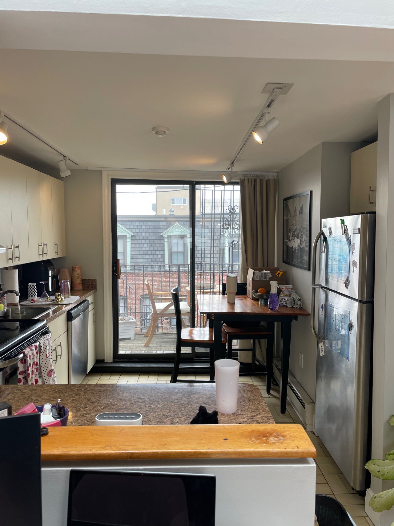 Unique Penthouse 1 bed w/ 2 Decks, exposed brick and laundry in unit! 