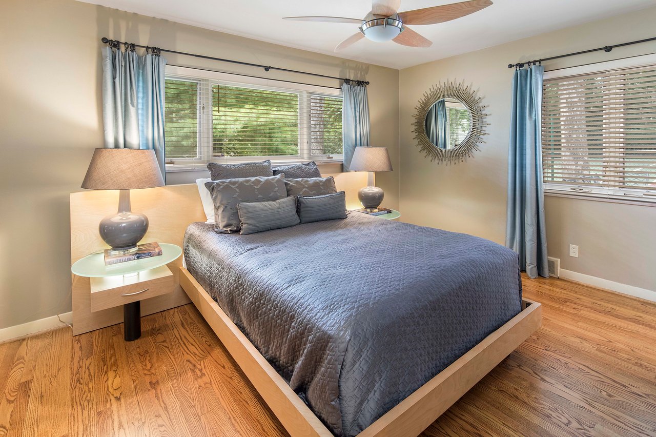 A Special Retreat on a Prized One Acre Lot With Pool and Tennis Court